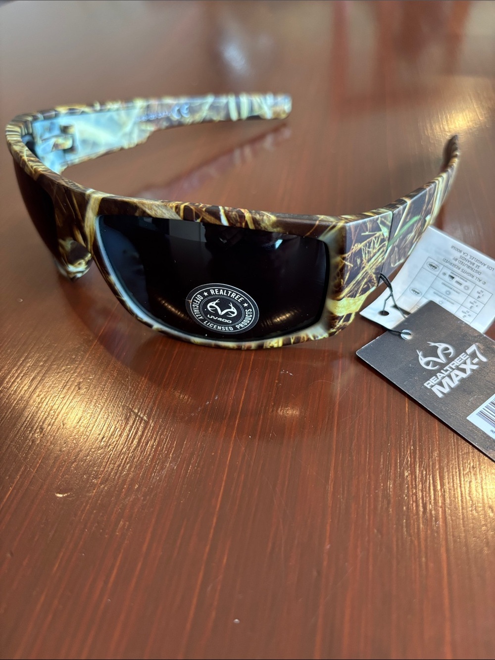 Realtree Max-7 UV 400 protection CAT 4. Black mirror lens, camo print sunglasses